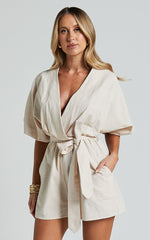 Kiro Playsuit - Linen V Neck Puff Sleeve Tie Waist Playsuit in Biscuit