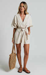 Kiro Playsuit - Linen V Neck Puff Sleeve Tie Waist Playsuit in Biscuit
