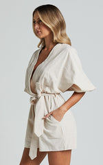 Kiro Playsuit - Linen V Neck Puff Sleeve Tie Waist Playsuit in Biscuit